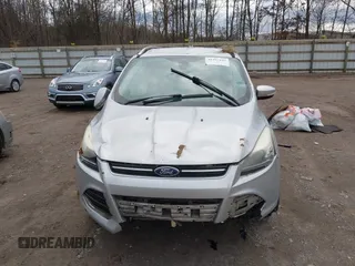 2014 Ford Escape Titanium with VIN 1FMCU9J94EUE51012, listed as a IAAI auction lot 41497105 with 153,031 mi miles. Bid and sale history available at carsss.com. Image 11.