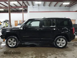 2014 Jeep Patriot Limited with VIN 1C4NJRCB8ED910340, listed as a IAAI auction lot 41396065 with 241,669 mi miles. Bid and sale history available at carsss.com. Image 14.