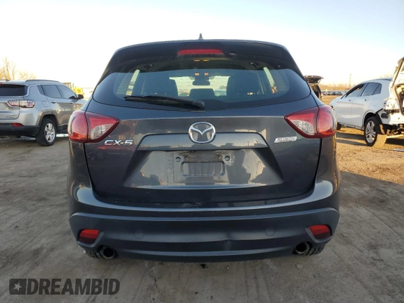 2016 Mazda CX-5 Sport with VIN JM3KE2BY9G0771969, listed as a Copart auction lot 80966064 with 99,348 mi miles and Salvage title. Bid and sale history available at DreamBid. Image 6.
