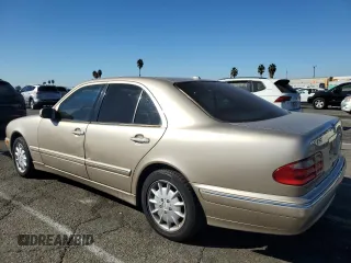 2000 Mercedes-Benz E-Class AWD with VIN WDBJF82G0YX029026, listed as a Copart auction lot 78106604 with 134,482 mi miles and Salvage Title. Bid and sale history available at carsss.com. Image 2.