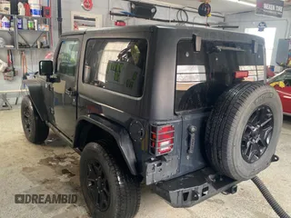 2017 Jeep Wrangler Willys Wheeler with VIN 1C4AJWAGXHL602088, listed as a Copart auction lot 45524745 with 101,847 mi miles and Clean Title. Bid and sale history available at DreamBid. Image 3.
