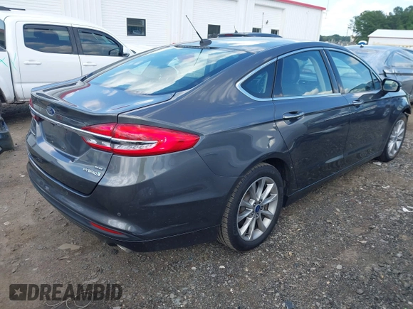 2017 Ford Fusion Hybrid SE z VIN 3FA6P0LU3HR260558, wystawiony jako IAAI lot #42657176 z przebiegiem 161 183 mil mil oraz . Historia ofert i sprzedaży dostępna na DreamBid. Obrazek 4.