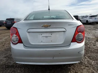 2014 Chevrolet Sonic LS with VIN 1G1JA5SH0E4209166, listed as a Copart auction lot 47402545 with 83,057 mi miles and Salvage title. Bid and sale history available at DreamBid. Image 6.