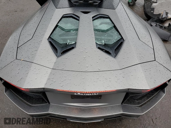 2014 Lamborghini Aventador z VIN ZHWUR1ZD6ELA03035, wystawiony jako Copart lot #66784084 z przebiegiem 23 771 mil mil oraz Szkoda całkowita • Salvage title. Historia ofert i sprzedaży dostępna na DreamBid. Obrazek 12.