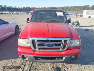 2011 Ford Ranger XLT with VIN 1FTLR4FE7BPA89265, listed as a IAAI auction lot 41669516 with 163,025 mi miles. Bid and sale history available at carsss.com. Image 12.