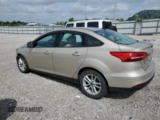 2017 Ford Focus SE with VIN 1FADP3F27HL301890, listed as a Copart auction lot 55252675 with 76,568 mi miles and Salvage title. Bid and sale history available at DreamBid. Image 2.