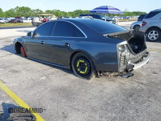 2015 Audi S8 z VIN WAUK2AFD5FN021986, wystawiony jako IAAI lot #41986491 z przebiegiem 142 073 mil mil oraz . Historia ofert i sprzedaży dostępna na DreamBid. Obrazek 3.
