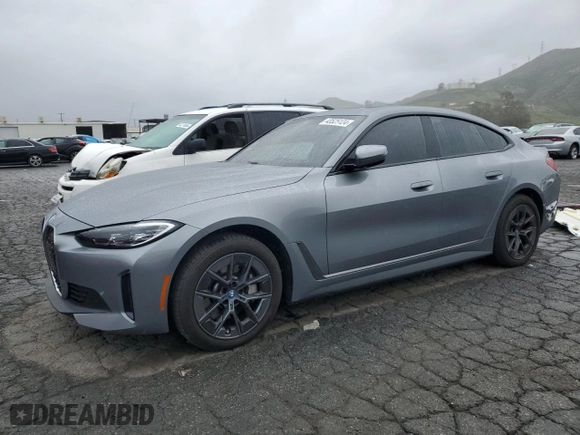 2023 BMW i4 eDrive40 with VIN WBY73AW08PFR23464, listed as a Copart auction lot 43525124 with 6,596 mi miles. Bid and sale history available at carsss.com. Image 1.