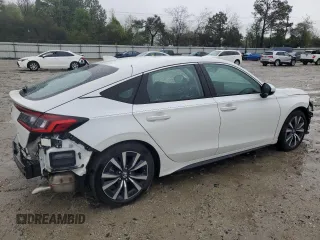 2024 Honda Civic EX-L z VIN 19XFL1H7XRE012055, wystawiony jako Copart lot #52017955 z przebiegiem 14 459 mil mil oraz Szkoda całkowita • Salvage title. Historia ofert i sprzedaży dostępna na DreamBid. Obrazek 3.