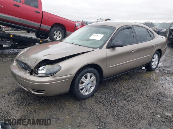2006 Ford Taurus SE z VIN 1FAFP53U26A197294, wystawiony jako IAAI lot #41506334 z przebiegiem 180 411 mil mil oraz . Historia ofert i sprzedaży dostępna na DreamBid. Obrazek 17.