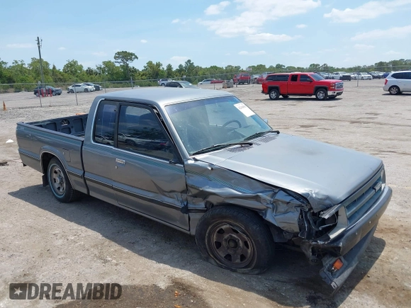 1992 Mazda B-Series Truck with VIN JM2UF313XN0306779, listed as a IAAI auction lot 42104583 with 137,826 mi miles and . Bid and sale history available at DreamBid. Image 1.