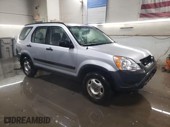 2002 Honda CR-V LX with VIN JHLRD68512C009941, listed as a Copart auction lot 87699075 with 133,311 mi miles and Salvage Title. Bid and sale history available at DreamBid. Image 4.