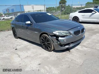 2013 BMW 5 Series 528i xDrive with VIN WBAXH5C59DDW15539, listed as a IAAI auction lot 41961479 with 133,052 mi miles. Bid and sale history available at carsss.com. Image 1.