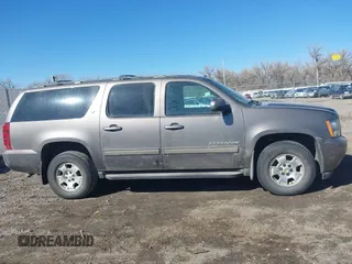 2011 Chevrolet Suburban LT with VIN 1GNSKJE34BR335361, listed as a IAAI auction lot 41736341 with 170,422 mi miles. Bid and sale history available at carsss.com. Image 14.