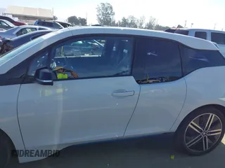2017 BMW i3 z VIN WBY1Z8C31HV894473, wystawiony jako IAAI lot #41870525 z przebiegiem 96 414 mil mil oraz . Historia ofert i sprzedaży dostępna na DreamBid. Obrazek 14.