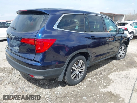 2018 Honda Pilot EX-L with VIN 5FNYF5H5XJB025960, listed as a IAAI auction lot 41843520 with 23,404 mi miles and . Bid and sale history available at DreamBid. Image 4.