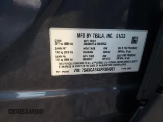 2023 Tesla Model X with VIN 7SAXCAE5XPF384061, listed as a Copart auction lot 86834084 with 6,974 mi miles and Salvage Title. Bid and sale history available at DreamBid. Image 15.