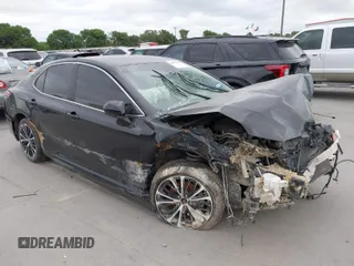 2020 Toyota Camry SE with VIN 4T1G11AK9LU946138, listed as a IAAI auction lot 42052004 with 99,583 mi miles. Bid and sale history available at carsss.com. Image 1.