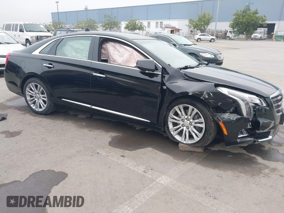 2018 Cadillac XTS Luxury with VIN 2G61M5S33J9119684, listed as a IAAI auction lot 41659807 with 107,156 mi miles and . Bid and sale history available at DreamBid. Image 1.