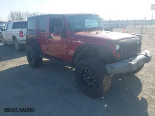 2012 Jeep Wrangler Unlimited Sport with VIN 1C4BJWDGXCL163905, listed as a IAAI auction lot 41784769 with 142,954 mi miles. Bid and sale history available at carsss.com. Image 1.
