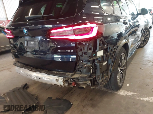 2022 BMW X5 xDrive45e with VIN 5UXTA6C05N9L41274, listed as a IAAI auction lot 42247190 with 18,701 mi miles and . Bid and sale history available at DreamBid. Image 21.
