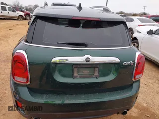 2019 MINI Countryman Cooper S z VIN WMZYT5C57K3G91854, wystawiony jako IAAI lot #41394154 z przebiegiem 68 629 mil mil oraz . Historia ofert i sprzedaży dostępna na DreamBid. Obrazek 16.