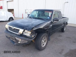 1999 Mazda B-Series 2WD Truck SE with VIN 4F4YR16V8XTM09770, listed as a IAAI auction lot 41416620 with 245,604 mi miles. Bid and sale history available at carsss.com. Image 6.