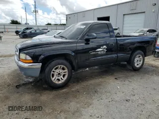2004 Dodge Dakota with VIN 1D7FL46N44S634830, listed as a Copart auction lot 69702714 with 306,816 mi miles and Salvage title. Bid and sale history available at DreamBid. Image 1.