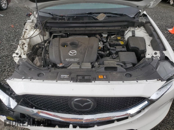 2019 Mazda CX-5 Grand Touring with VIN JM3KFBDM4K0669589, listed as a Copart auction lot 54948455 with 64,475 mi miles and Salvage Title. Bid and sale history available at carsss.com. Image 12.