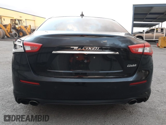 2019 Maserati Ghibli z VIN ZAM57XSA3K1325881, wystawiony jako Copart lot #80973694 z przebiegiem 64 189 mil mil oraz Szkoda całkowita • Salvage title. Historia ofert i sprzedaży dostępna na DreamBid. Obrazek 6.
