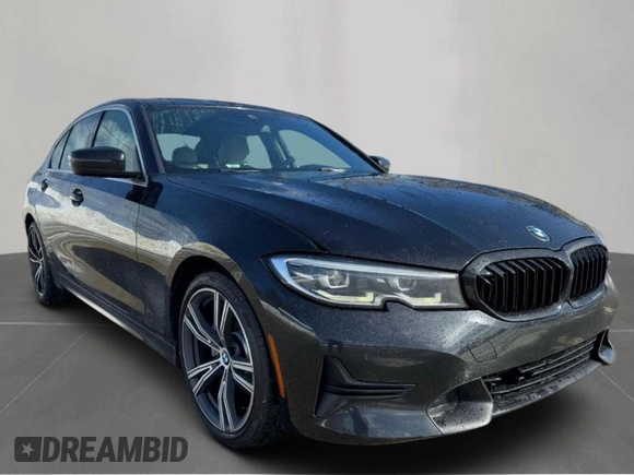 2021 BMW 3 Series 330i with VIN 3MW5R1J04MBB48483, listed as a Copart auction lot 50515195 with 128,555 mi miles and Clean Title. Bid and sale history available at carsss.com. Image 1.