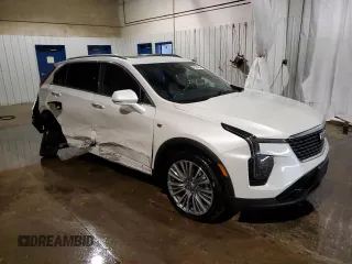 2024 Cadillac XT4 AWD Premium Luxury z VIN 1GYFZDR49RF100387, wystawiony jako Copart lot #76304794 z przebiegiem 14 649 mil mil oraz Szkoda całkowita • Salvage title. Historia ofert i sprzedaży dostępna na DreamBid. Obrazek 4.