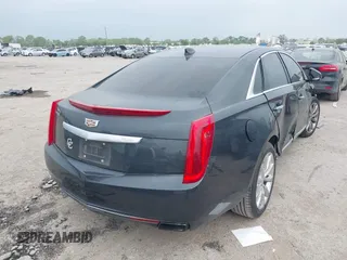 2017 Cadillac XTS Luxury with VIN 2G61M5S35H9143656, listed as a IAAI auction lot 41929023 with 141,033 mi miles and . Bid and sale history available at DreamBid. Image 4.