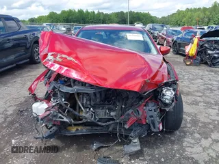 2014 Mazda 3 S Grand Touring z VIN JM1BM1M32E1100092, wystawiony jako IAAI lot #42248984 z przebiegiem 139 937 mil mil oraz . Historia ofert i sprzedaży dostępna na DreamBid. Obrazek 13.