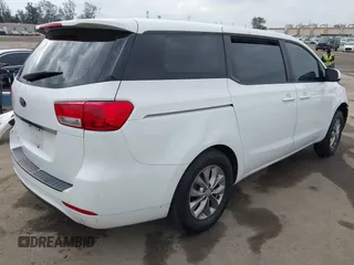 2016 Kia Sedona L with VIN KNDMA5C12G6151168, listed as a IAAI auction lot 42117087 with 99,743 mi miles. Bid and sale history available at carsss.com. Image 4.
