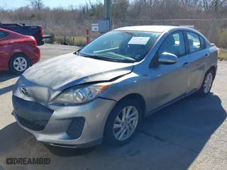 2012 Mazda Mazda3 i Touring with VIN JM1BL1VF1C1514215, listed as a IAAI auction lot 41728974 with 209,802 mi miles. Bid and sale history available at carsss.com. Image 2.