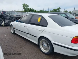 2000 BMW 5 Series 528i z VIN WBADM6341YGU07316, wystawiony jako IAAI lot #42436386 z przebiegiem Nie podano mil oraz . Historia ofert i sprzedaży dostępna na DreamBid. Obrazek 6.