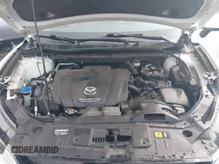 2015 Mazda CX-5 Grand Touring with VIN JM3KE4DY0F0483037, listed as a IAAI auction lot 41578222 with 102,988 mi miles. Bid and sale history available at carsss.com. Image 10.