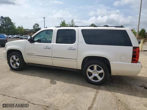 2012 Chevrolet Suburban LTZ with VIN 1GNSCKE06CR285430, listed as a Copart auction lot 54197795 with 307,217 mi miles and Clean Title. Bid and sale history available at carsss.com. Image 2.