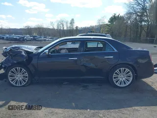 2012 Chrysler 300 C Luxury Series with VIN 2C3CCAPT3CH253909, listed as a IAAI auction lot 41990734 with 95,881 mi miles and . Bid and sale history available at carsss.com. Image 14.