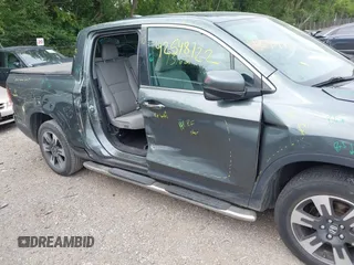 2018 Honda Ridgeline RTL-T with VIN 5FPYK3F61JB013733, listed as a IAAI auction lot 42548122 with 92,407 mi miles and . Bid and sale history available at DreamBid. Image 6.