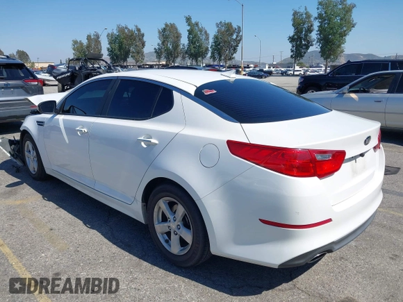 2015 Kia Optima LX z VIN KNAGM4A71F5594595, wystawiony jako IAAI lot #42226773 z przebiegiem 133 194 mil mil oraz . Historia ofert i sprzedaży dostępna na DreamBid. Obrazek 3.