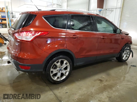 2014 Ford Escape Titanium with VIN 1FMCU9J94EUC25357, listed as a Copart auction lot 47595705 with 124,626 mi miles and Salvage Title. Bid and sale history available at DreamBid. Image 3.