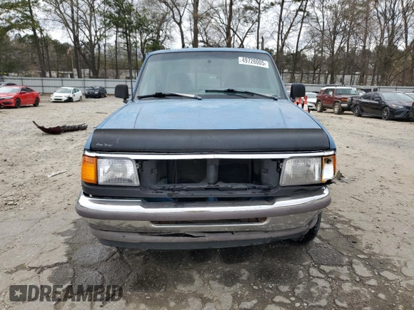 1993 Ford Ranger XL with VIN 1FTCR14A1PTA64939, listed as a Copart auction lot 49728005 with 64,609 mi miles and Salvage Title. Bid and sale history available at carsss.com. Image 5.
