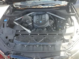 2023 BMW X5 M50i z VIN 5UXJU4C09P9P94657, wystawiony jako Copart lot #50709685 z przebiegiem Nie podano mil oraz Szkoda całkowita • Salvage title. Historia ofert i sprzedaży dostępna na DreamBid. Obrazek 12.
