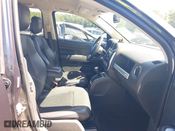 2015 Jeep Compass Latitude with VIN 1C4NJCEBXFD179373, listed as a IAAI auction lot 39380614 with 104,832 mi miles. Bid and sale history available at carsss.com. Image 5.