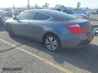 2009 Honda Accord Cpe EX with VIN 1HGCS12759A018803, listed as a IAAI auction lot 41975016 with 107,013 mi miles. Bid and sale history available at carsss.com. Image 3.