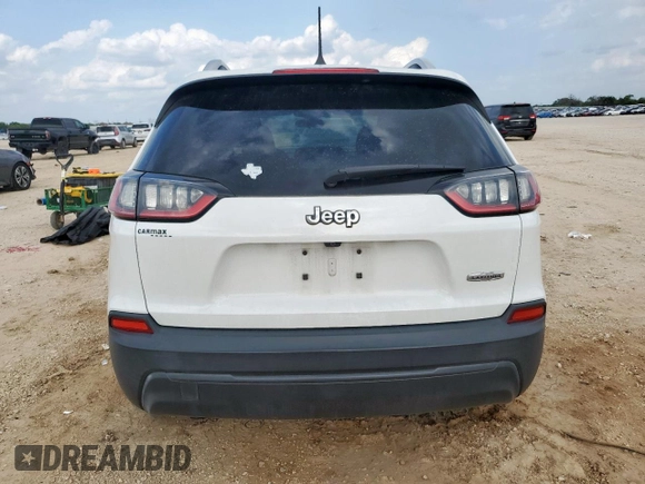 2019 Jeep Cherokee Latitude with VIN 1C4PJLCB2KD307482, listed as a Copart auction lot 59474485 with 69,628 mi miles and Salvage title. Bid and sale history available at DreamBid. Image 6.