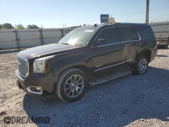 2015 GMC Yukon Denali with VIN 1GKS2CKJ9FR173812, listed as a Copart auction lot 72577144 with 207,940 mi miles and Salvage Title. Bid and sale history available at carsss.com. Image 1.