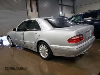 2001 Mercedes-Benz E-Class with VIN WDBJF65J11B357053, listed as a Copart auction lot 48805155 with 188,038 mi miles and Salvage Title. Bid and sale history available at carsss.com. Image 2.